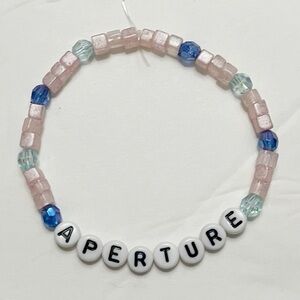 Harry Styles Friendship Bracelet Aperture